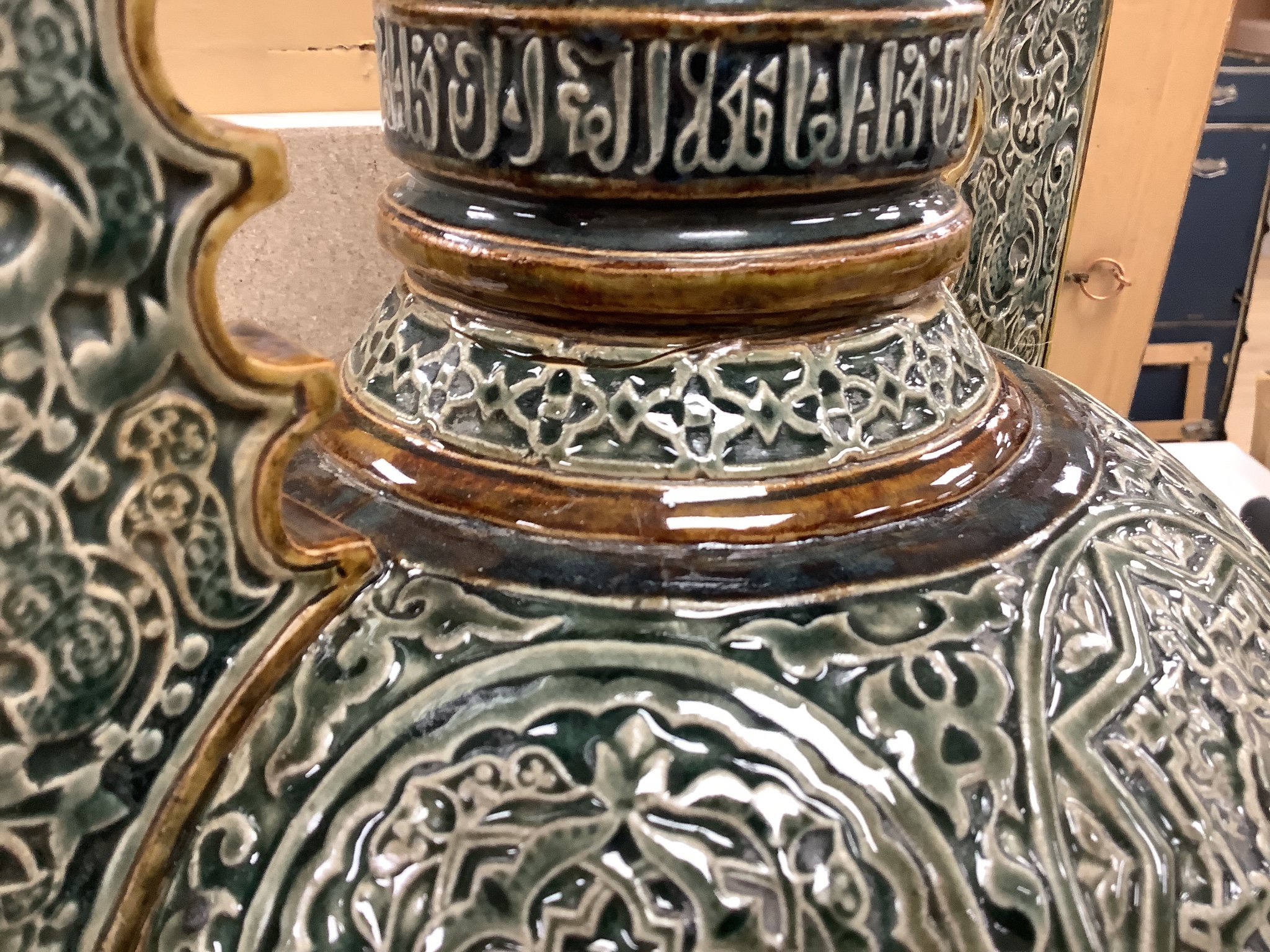 A large Doulton Lambeth Islamic inspired two handled glazed stoneware vase, dated 1880, 47cm, repairs